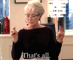 A woman makes a shooing gesture and says "that's all."