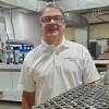 Dean Burrows runs Gear Motions, which makes precision gears for machines. He's been turning down some orders, because he can't find enough workers.