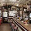 The inside of an empty diner.