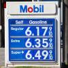 Gas prices are displayed at a Mobil gas station in Los Angeles on Oct. 28, 2022. ExxonMobil posted record earnings in 2022, benefitting from a surge in oil prices.