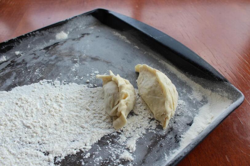 Homemade dumplings ready to cook.