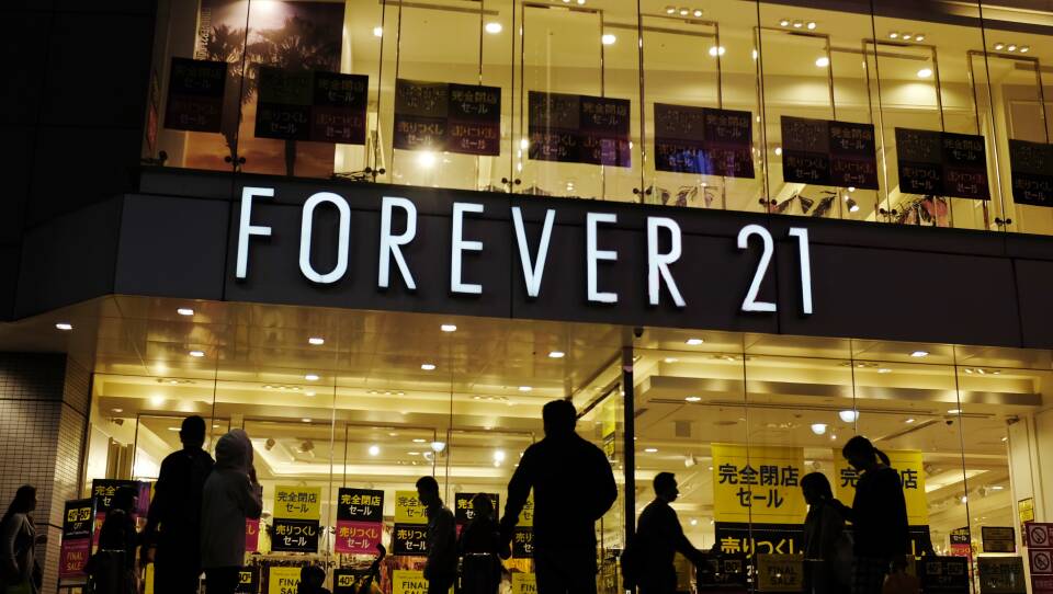 Three companies are purchasing the clothing brand Forever 21, shown here in Tokyo, after it filed for bankruptcy last year.