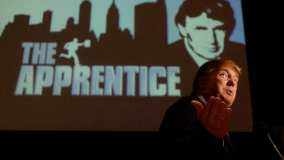 ap_0407090463-top-photo-trump-apprentice-banner-behind-7766e49a0b4bf7bbeb4bd8ebd27edc1bff3e463c.jpg