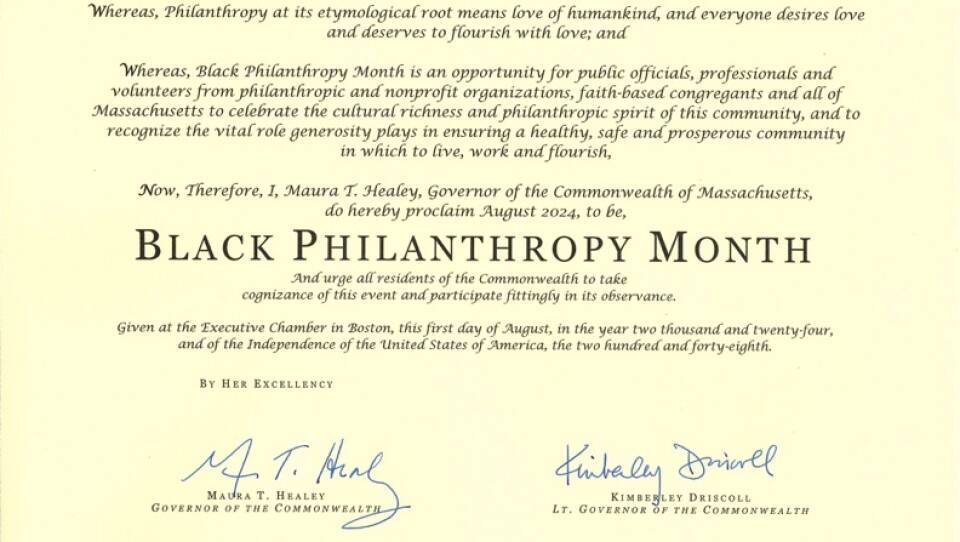 A document reads "Now, therefore, I, Maura T. Healey, Governor of the commonwealth of Massachusetts, do hereby proclaim August 2024 to be Black Philanthropy Month."