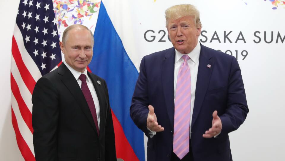 President Trump owes his 2016 election win to Russian President Vladimir Putin, former President Jimmy Carter said on Friday. Here, Trump and Putin are seen meeting on the sidelines of the G-20 summit in Osaka.