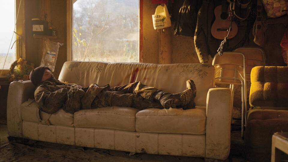 'Sasha' resting. He, as most of the activists, prefers to use a 'forest name' to hide his identity.