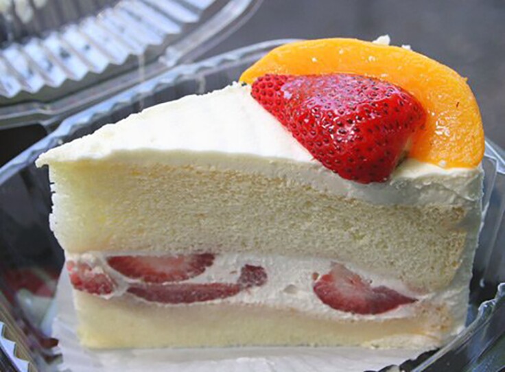 Egg white cake is filled with fresh crème and strawberries from Eldo Cake House.
