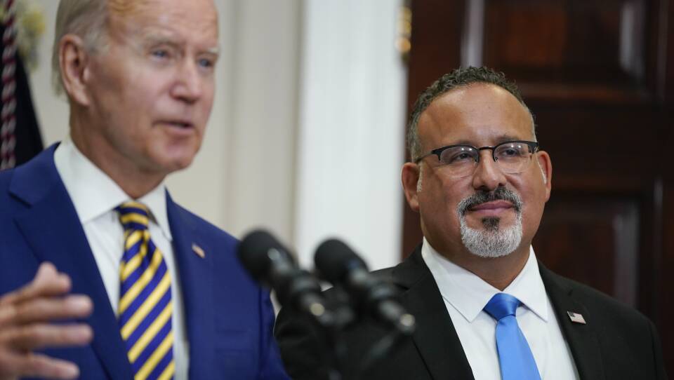 U.S. Education Secretary Miguel Cardona appeared alongside President Biden when he announced his student loan relief plan on Aug. 24. On Thursday, the administration quietly changed its guidance around which borrowers qualify for this relief.