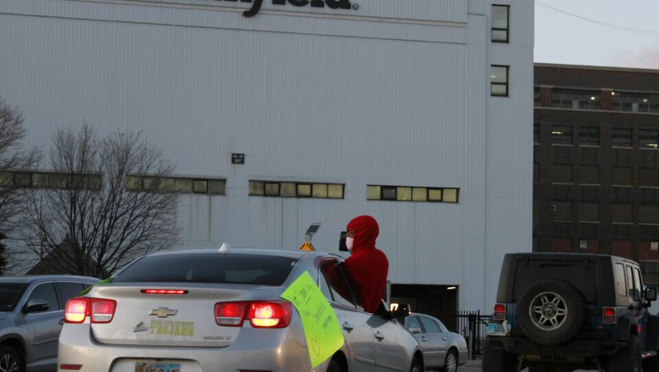 Employees and family members protest outside a Smithfield Foods processing plant in Sioux Falls, South Dakota last week. The plant has had an outbreak of coronavirus cases.