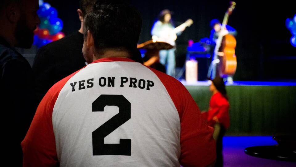 A Proposition 2 supporter on election night at a watch party for patient advocates in Utah.