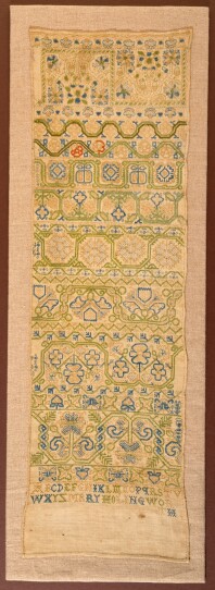 A long floral embroidery sampler from the 17th century.
