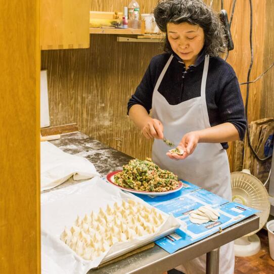 The Dumpling Lady at Qingdao Garden in Cambridge making the pork-and-leek dumplings by hand.