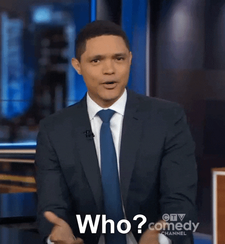 A man casually asks "Who?"