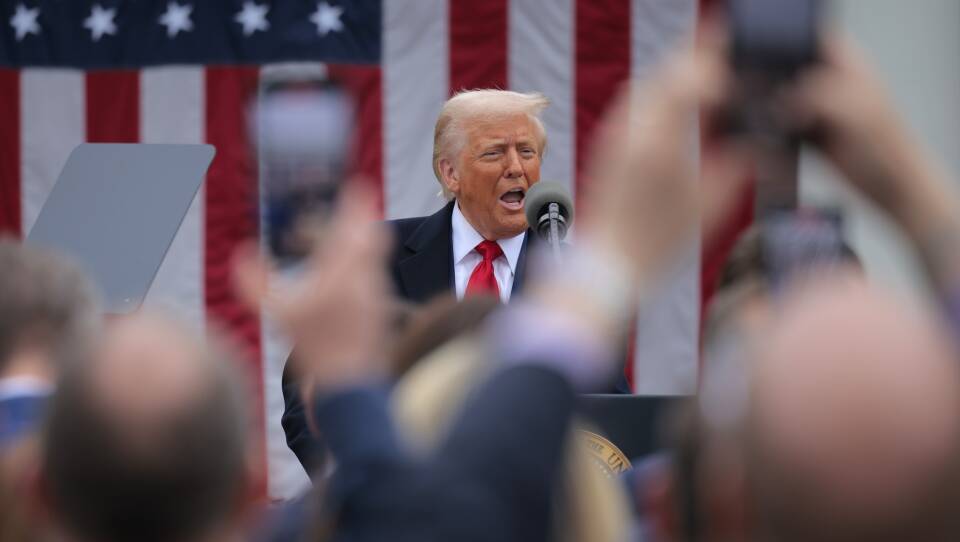 President Donald J Trump speaks to reporters after signing an executive order in the Oval Office at the White House on March 26.