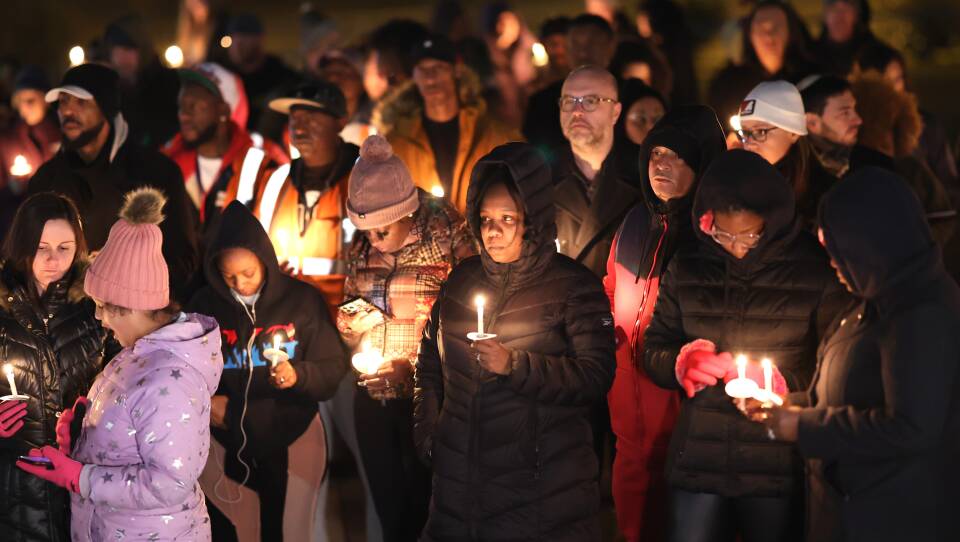 People attend a candlelight vigil in memory of Tyre Nichols at a park on Thursday in Memphis, Tenn.