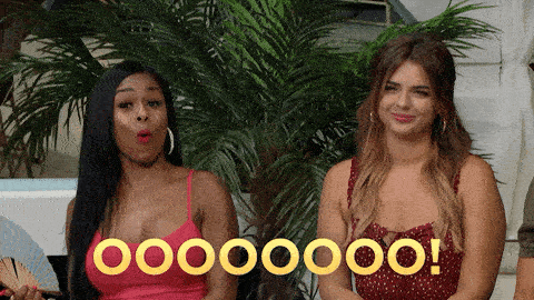 A woman turns to her friend and says "Oooooh!"