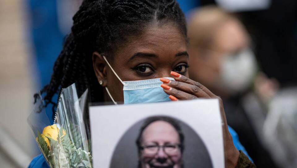Nurses and health care workers mourn and remember their colleagues who died during the outbreak of the novel coronavirus during a demonstration outside Mount Sinai Hospital in New York.