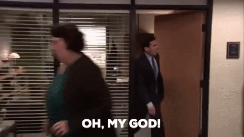 A man yells "oh my god! ok, it's happening." as other office workers mill around in panic