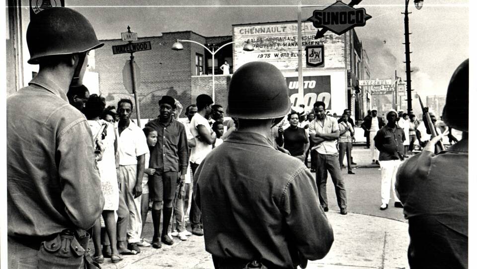 Troops and protesters face each other on Linwood Avenue during 1967 Detroit Race Riots