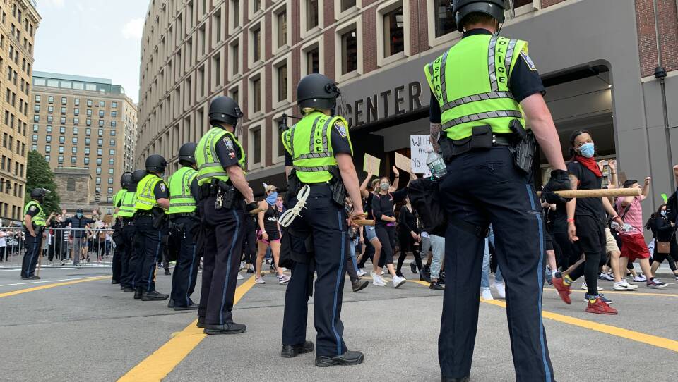Police Officers outside a protest for police reform in Boston over the summer