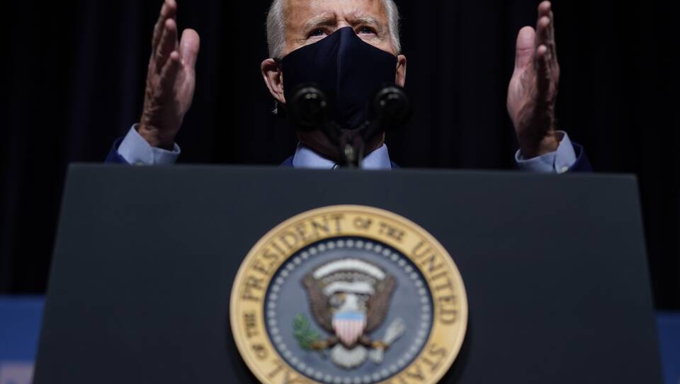 President Biden said the attack on the Capitol "has reminded us that democracy is fragile." Above, Biden speaks during a visit Thursday to the National Institutes of Health in Bethesda, Md.