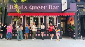 Patrons standing outside of Dani's Queer bar in Boston, waiting to enter.