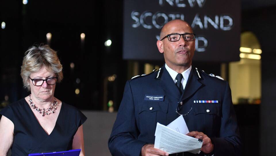 The U.K.'s head of Counter Terrorism Policing Neil Basu (right) and the chief medical officer for England Dame Sally Davies, speak at a news conference at New Scotland Yard in London on Wednesday. British police say a couple who are critically ill were exposed to the Russian nerve agent Novichok.