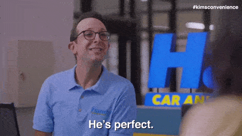 A man smiles and says "he's perfect."