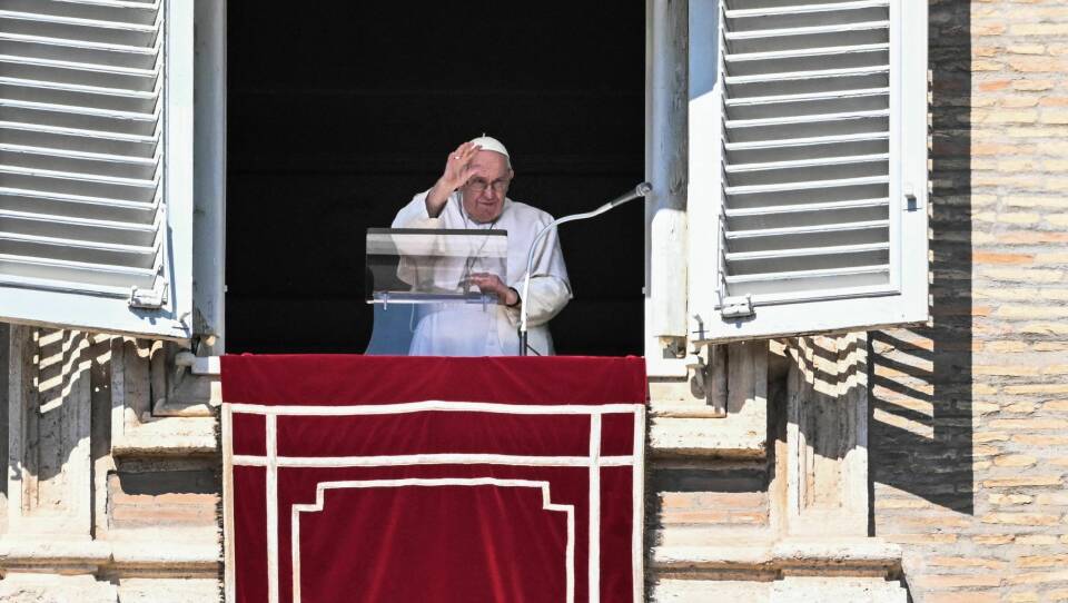 Pope Francis waves from the window of the apostolic palace during the weekly Angelus prayer on March 12, 2023 in The Vatican.
