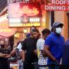People queue to enter a restaurant in New Orleans' French Quarter in early August.