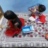 Twin sisters Tripti and Pari, who lost both their parents to COVID-19, play at a relative's home in Bhopal, India on May 11, 2021. A new study estimates that 8 million kids lost a parent or primary caregiver to a pandemic-related cause.