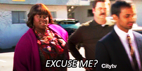 A woman, annoyed, says "Excuse me?"