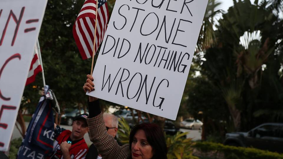 Cindy Falco di Corrado joins with others to show their support for Roger Stone, a longtime adviser to President Trump. A number of Republicans have raised concerns about the way Stone was arrested at his home on Jan. 25.