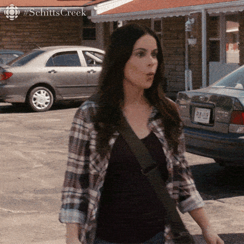 A woman, annoyed, asks "what are we doing here?"