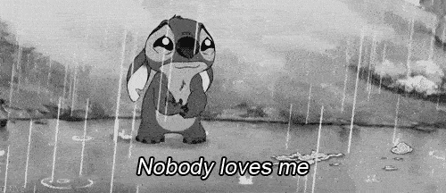 A small creature cries in the rain with the caption "nobody loves me."