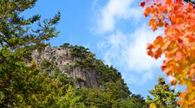  Hikers work their way up the Beehive in Acadia National Park in early Oct. 2022.