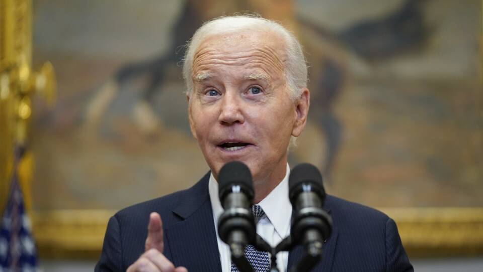 The president speaks from a podium