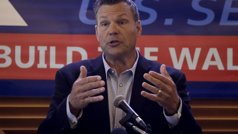 Former Kansas Secretary of State Kris Kobach addresses the crowd as he announces his candidacy for the Republican nomination for the U.S. Senate Monday, July 8, 2019, in Leavenworth, Kan. (AP Photo/Charlie Riedel)