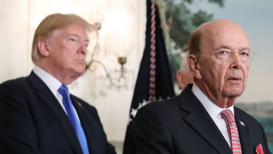 President Trump listens as Commerce Secretary Wilbur Ross, who oversees the census, speaks at the White House in 2018. Ross approved including on the 2020 census the question, "Is this person a citizen of the United States?"