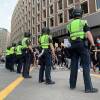 Police Officers outside a protest for police reform in Boston over the summer
