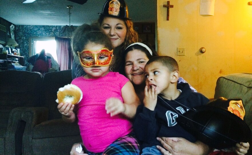 Michelle Jones, rear, and Lori Jones, center, with Michelle's two younger children.
