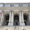 People walk along the stairs of the New York Public Library on July 06, 2021 in Midtown Manhattan in New York City.