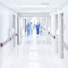 Doctors walking down hospital corridor