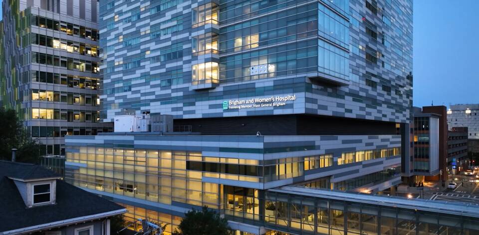 A glass-and-metal hospital building.