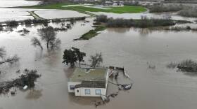 A home is submerged in floodwater, after the Salinas River overflowed its banks on Friday.