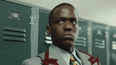 A young man makes a face that says "excuse me, what?!"