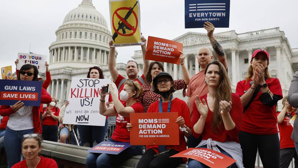 Gun control advocacy groups rally with Democratic members of Congress outside the U.S. Capitol on May 26, 2022. Organized by Moms Demand Action, Everytown for Gun Safety, and Students Demand Action, the rally brought together members of Congress and gun violence survivors to demand gun safety legislation following mass shootings in Buffalo, N.Y., and Uvalde, Texas.