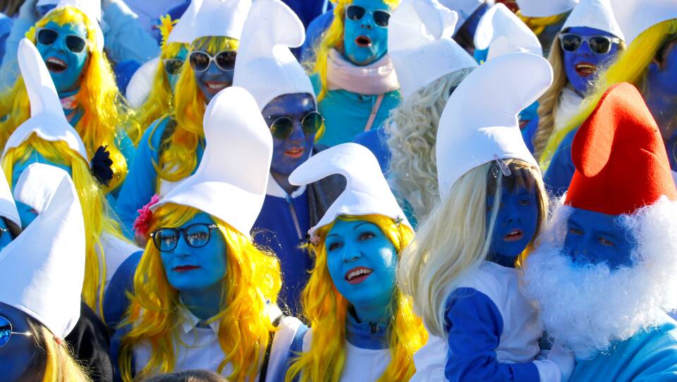 Participants dressed as Smurfs gather in an attempt to set the record for the world's largest meeting of Smurfs in Lauchringen, Germany, on Feb. 16, 2019.