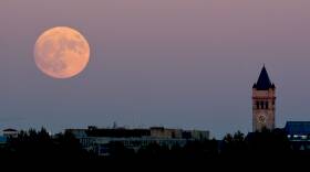 A supermoon rises over Washington, D.C., in November 2016. After this week's Strawberry Supermoon, there will be two more in July and August.