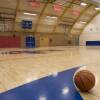 Basketball on gym floor